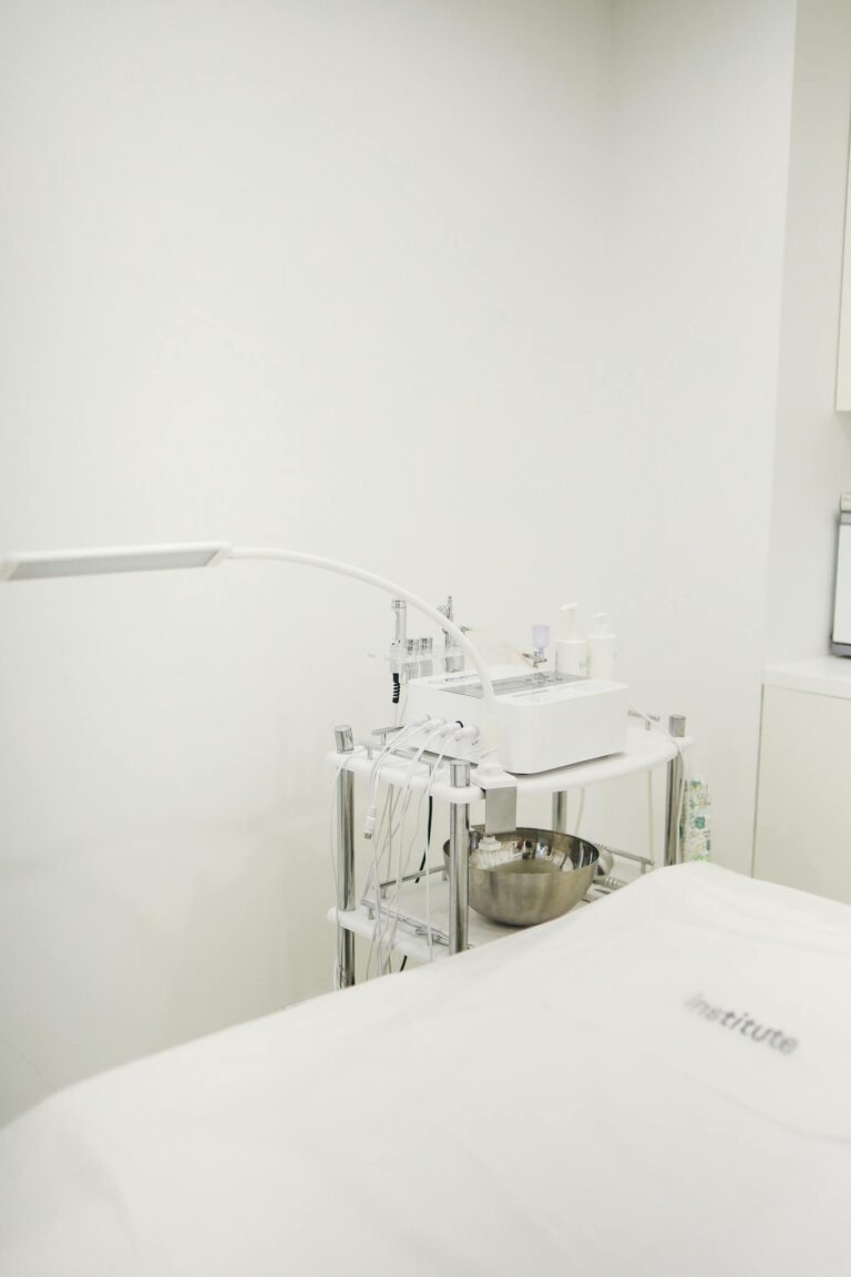 Minimalist beauty salon interior with high-end skincare equipment for treatments.